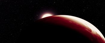 Movie still from “Lucky Number Slevin” (2006), directed by Paul McGuigan – The sun is shining on the surface of a red planet; Extreme Wide shot, Low angle