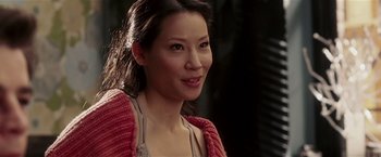 Movie still from “Lucky Number Slevin” (2006), directed by Paul McGuigan – A person wearing a sweater; Close Up shot, Over the shoulder angle