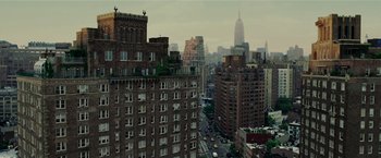 Movie still from “Lucky Number Slevin” (2006), directed by Paul McGuigan – An aerial view of a large city with tall skyscrapers; Extreme Wide shot, High angle
