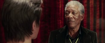 Movie still from “Lucky Number Slevin” (2006), directed by Paul McGuigan – An older man is talking to a young man; Close Up shot, Over the shoulder angle