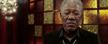 Movie still from “Lucky Number Slevin” (2006), directed by Paul McGuigan – An older man in a black jacket and a black shirt; Close Up shot, Low angle