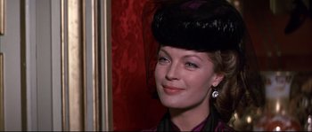 Movie still from “Ludwig” (1973), directed by Luchino Visconti – A person wearing a hat; Close Up shot, Over the shoulder angle