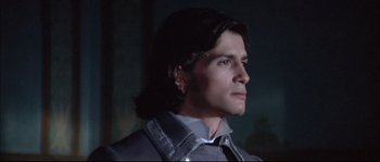 Movie still from “Ludwig” (1973), directed by Luchino Visconti – A person with long hair; Close Up shot, Low angle
