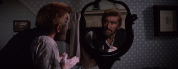 Movie still from “Lust for Life” (1956), directed by George Cukor – A man looking at himself in the mirror; Close Up shot, Over the shoulder angle