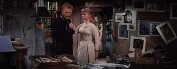 Movie still from “Lust for Life” (1956), directed by George Cukor – A man standing next to a woman in a room; Medium shot, Over the shoulder angle