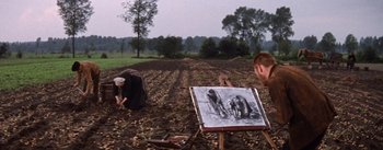 Movie still from “Lust for Life” (1956), directed by George Cukor – Two people in a field with an easel; Wide shot, High angle