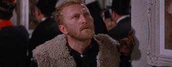 Movie still from “Lust for Life” (1956), directed by George Cukor – A person wearing a jacket; Close Up shot, Low angle