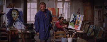 Movie still from “Lust for Life” (1956), directed by George Cukor – Two men are painting in an artist's studio; Medium shot, Low angle