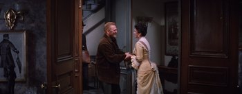 Movie still from “Lust for Life” (1956), directed by George Cukor – An older man and a younger woman are holding hands; Medium shot, Over the shoulder angle