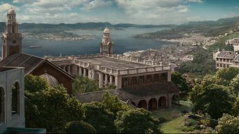 Movie still from “Lust, Caution” (2007), directed by Ang Lee – An aerial view of an old building with a clock tower; Extreme Wide shot, High angle