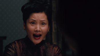 Movie still from “Lust, Caution” (2007), directed by Ang Lee – A person wearing a black shirt; Close Up shot, Over the shoulder angle