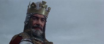 Movie still from “Macbeth” (1971), directed by Roman Polanski – A person wearing a crown; Close Up shot, Low angle