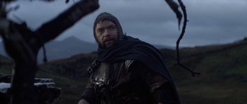 Movie still from “Macbeth” (1971), directed by Roman Polanski – A man in a medieval outfit standing in a field; Close Up shot, Low angle
