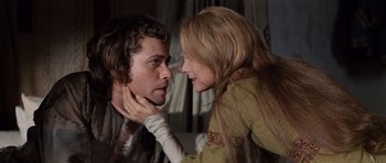 Movie still from “Macbeth” (1971), directed by Roman Polanski – A man and a woman face to face in a room; Close Up shot, Low angle