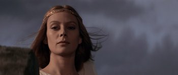 Movie still from “Macbeth” (1971), directed by Roman Polanski – A beautiful woman with long brown hair wearing a gold head piece; Close Up shot, Low angle