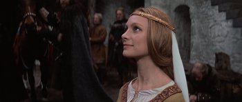 Movie still from “Macbeth” (1971), directed by Roman Polanski – A woman in a medieval dress looking up; Close Up shot, Over the shoulder angle