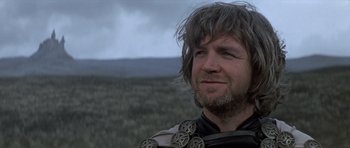 Movie still from “Macbeth” (1971), directed by Roman Polanski – A person with a beard; Close Up shot, Low angle