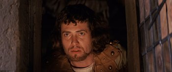 Movie still from “Macbeth” (1971), directed by Roman Polanski – A person with long brown hair; Close Up shot, Low angle