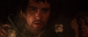 Movie still from “Macbeth” (1971), directed by Roman Polanski – A man's face in the dark; Close Up shot, Overhead angle