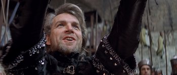 Movie still from “Macbeth” (1971), directed by Roman Polanski – A person with a beard; Close Up shot, Low angle