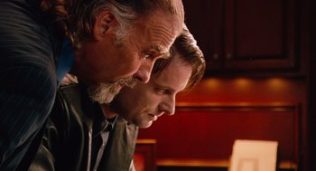 Movie still from “Machete” (2010), directed by Robert Rodriguez – A man and a boy are looking at each other; Close Up shot, Over the shoulder angle