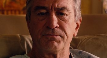 Movie still from “Machete” (2010), directed by Robert Rodriguez – An older man is looking at the camera; Close Up shot, Over the shoulder angle