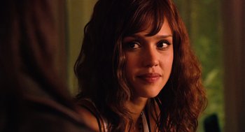 Movie still from “Machete” (2010), directed by Robert Rodriguez – A person with long brown hair; Close Up shot, Over the shoulder angle