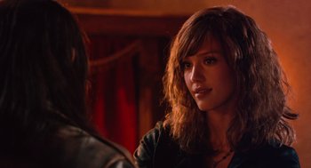 Movie still from “Machete” (2010), directed by Robert Rodriguez – A young woman is sitting in front of another woman; Close Up shot, Over the shoulder angle