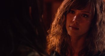 Movie still from “Machete” (2010), directed by Robert Rodriguez – A person with long curly hair; Close Up shot, Over the shoulder angle