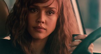 Movie still from “Machete” (2010), directed by Robert Rodriguez – A person holding a cell phone; Close Up shot, Over the shoulder angle