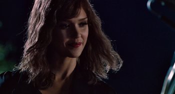 Movie still from “Machete” (2010), directed by Robert Rodriguez – A person wearing a black shirt; Close Up shot, Over the shoulder angle