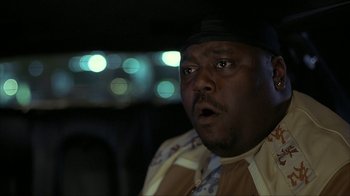 Movie still from “Made” (2001), directed by Jon Favreau – A person in a car at night; Close Up shot, Low angle