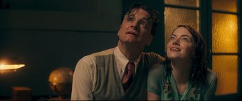 Movie still from “Magic in the Moonlight” (2014), directed by Woody Allen – A man and a woman looking up at something; Close Up shot, Low angle