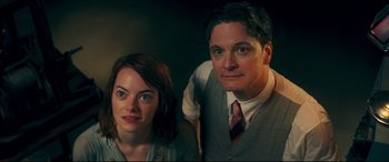 Movie still from “Magic in the Moonlight” (2014), directed by Woody Allen – A man and a woman posing for a picture; Close Up shot, Low angle