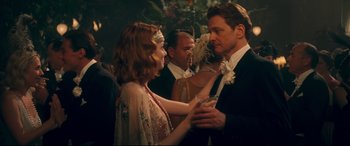 Movie still from “Magic in the Moonlight” (2014), directed by Woody Allen – A man and a woman dancing at an event; Medium shot, Over the shoulder angle