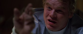 Movie still from “Magnolia” (1999), directed by Paul Thomas Anderson – A person holding a knife; Close Up shot, Low angle