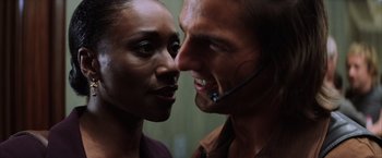 Movie still from “Magnolia” (1999), directed by Paul Thomas Anderson – A man and a woman face to face with one of them looking at each other; Close Up shot, Over the shoulder angle