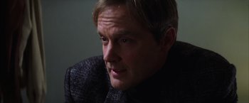 Movie still from “Magnolia” (1999), directed by Paul Thomas Anderson – A person wearing a sweater; Close Up shot, Over the shoulder angle
