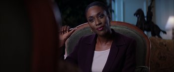 Movie still from “Magnolia” (1999), directed by Paul Thomas Anderson – A woman is sitting in a chair and holding a toothbrush in her hand; Close Up shot, Over the shoulder angle