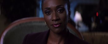 Movie still from “Magnolia” (1999), directed by Paul Thomas Anderson – A person wearing a suit; Close Up shot, High angle