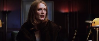 Movie still from “Magnolia” (1999), directed by Paul Thomas Anderson – A person wearing a fur coat; Close Up shot, Low angle