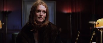 Movie still from “Magnolia” (1999), directed by Paul Thomas Anderson – A person wearing a fur coat; Close Up shot, Over the shoulder angle