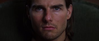 Movie still from “Magnolia” (1999), directed by Paul Thomas Anderson – A person with long hair; Close Up shot, Over the shoulder angle