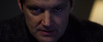 Movie still from “Magnolia” (1999), directed by Paul Thomas Anderson – A man's face with blue eyes; Close Up shot, Low angle