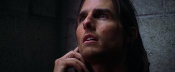 Movie still from “Magnolia” (1999), directed by Paul Thomas Anderson – A person with long dark hair; Close Up shot, Low angle