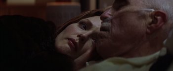 Movie still from “Magnolia” (1999), directed by Paul Thomas Anderson – A person laying on a bed; Close Up shot, Low angle