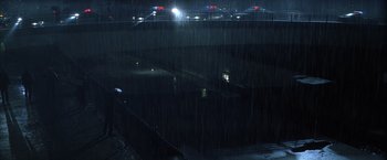 Movie still from “Magnolia” (1999), directed by Paul Thomas Anderson – A view of a bridge at night with lights on; Extreme Wide shot, High angle