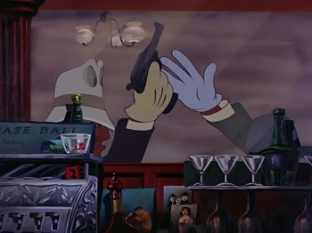 Movie still from “Make Mine Music” (1946), directed by Hamilton Luske – A painting on the side of a wall of a man holding a gun; Medium shot, Low angle