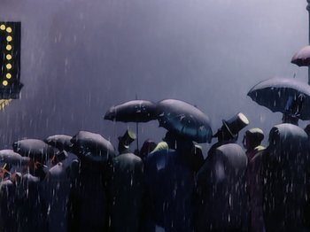 Movie still from “Make Mine Music” (1946), directed by Hamilton Luske – A group of people standing in the rain holding umbrellas; Extreme Wide shot, Low angle
