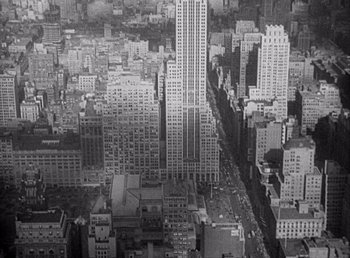 Movie still from “Make Way for Tomorrow” (1937), directed by Leo McCarey – An aerial view of a large city with skyscrapers; Extreme Wide shot, High angle